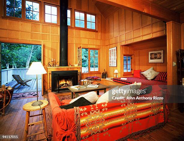 cabin interior - log cabin fire stock pictures, royalty-free photos & images