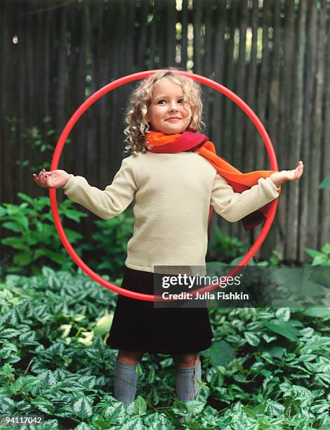 girl with plastic hoop - fishkin stock pictures, royalty-free photos & images