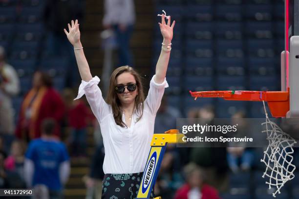 Notre Dame Fighting Irish manager Maggie Rogers celebrates after winning the National Championship game between the Mississippi State Lady Bulldogs...