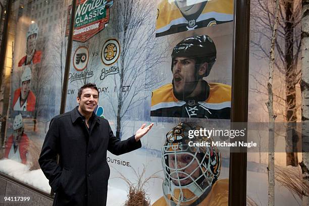 Milan Lucic, of the Boston Bruins, visits the NHL Winter Classic window display at the NBC Experience Center at Rockefeller Center on December 7,...