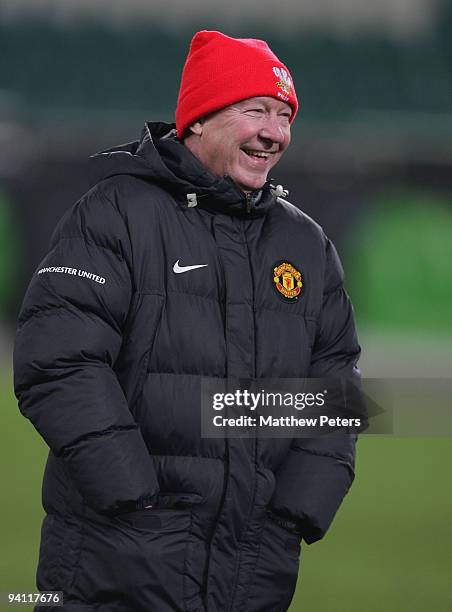 Sir Alex Ferguson of Manchester United in action during a first team training session ahead of their UEFA Champions League match against VfL...
