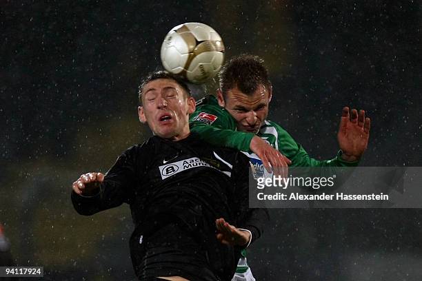Bernd Nehrig of Fuerth battles for the ball with Manuel Junglas of Aachen during the Second Bundesliga match between SpVgg Greuther Fuerth and...