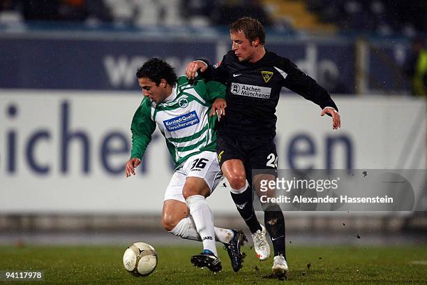 Sercan Sararer of Fuerth battles for the ball with Daniel Adlung of Aachen during the Second Bundesliga match between SpVgg Greuther Fuerth and...