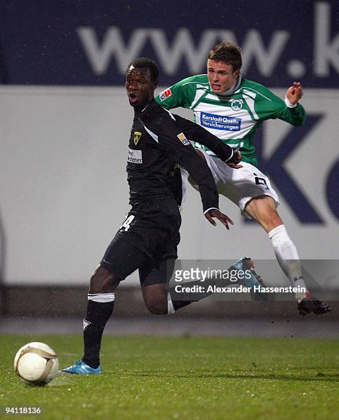 Babacar Gueye of Aachen battles for the ball with Nicolai Mueller of Fuerth during the Second Bundesliga match between SpVgg Greuther Fuerth and...