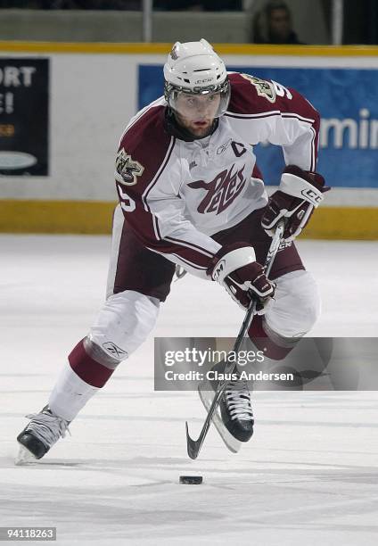Zack Kassian of the Peterborough Petes skates with the puck in a game against the Windsor Spitfires on December 5,2009 at the Peterborough Memorial...