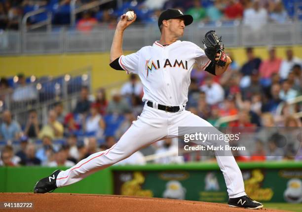 Trevor Richards of the Miami Marlins throws his first pitch in his major league debut in the first inning against the Boston Red Sox at Marlins Park...