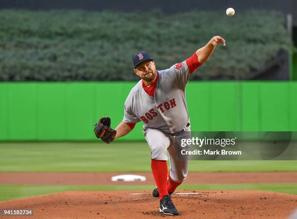 Brian Johnson of the Boston Red Sox warms up in the first inning against the Miami Marlins at Marlins Park on April 2, 2018 in Miami, Florida.