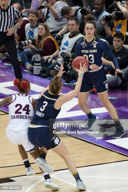 Notre Dame Fighting Irish forward Kathryn Westbeld inbounds a pass to Notre Dame Fighting Irish guard Marina Mabrey in the National Championship game...