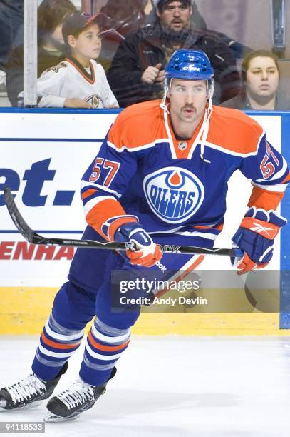 Colin McDonald of the Edmonton Oilers warms up before his first ever NHL game, the game came against the San Jose Sharks at Rexall Place on November...