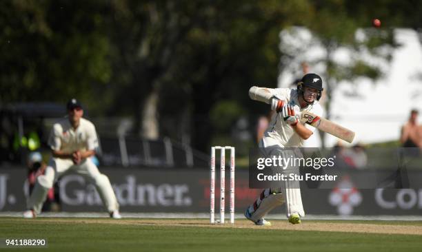 New Zealand batsman Tom Latham drives for runs during day five of the Second Test Match between the New Zealand Black Caps and England at Hagley Oval...