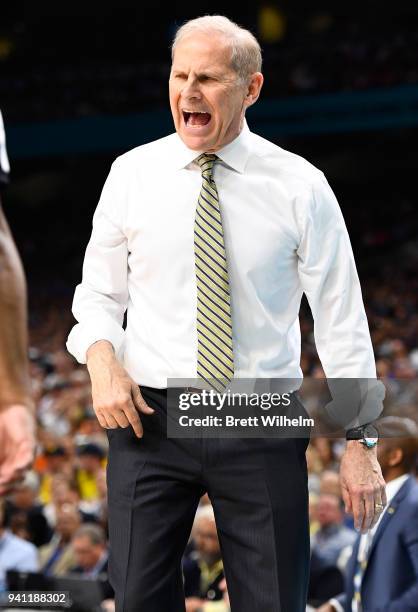 Head coach John Beilein of the Michigan Wolverines yells from the sideline during the first half of the 2018 NCAA Photos via Getty Images Men's Final...