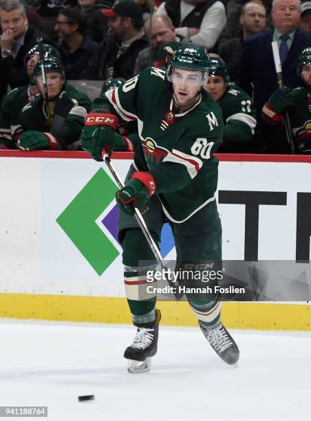 Carson Soucy of the Minnesota Wild passes the puck in his debut against the Edmonton Oilers during the second period of the game on April 2, 2018 at...