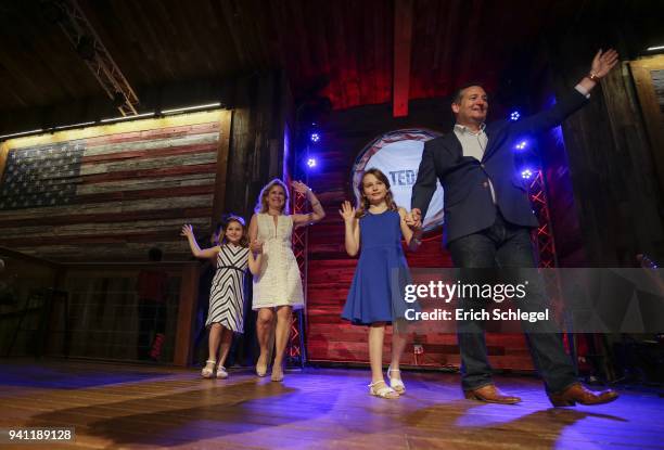 Sen. Ted Cruz walks out with his wife Heidi and children to launch his re-election campaign at the Redneck Country Club on April 2, 2018 in Stafford,...