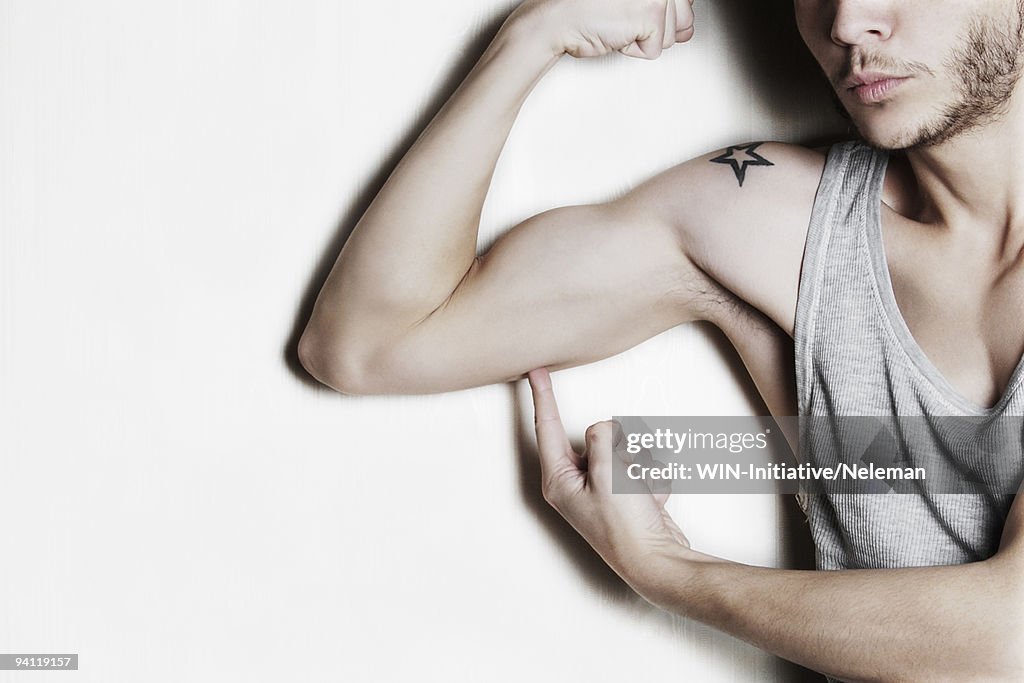 Man showing his biceps muscles