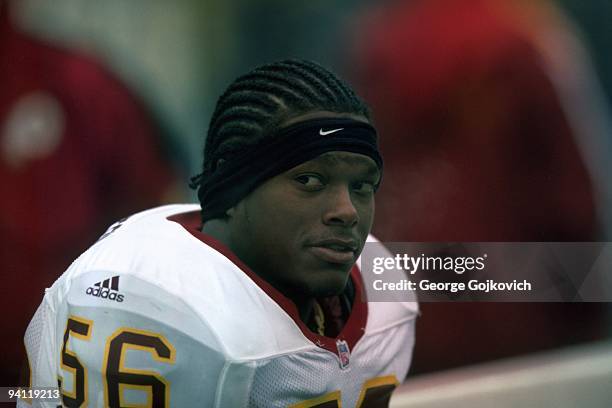 Linebacker LaVar Arrington of the Washington Redskins looks on from the sideline during a game against the Pittsburgh Steelers at Three Rivers...