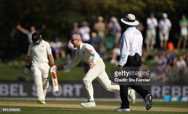 England bowler Jack Leach celebrates after taking the wicket of Tom Latham during day five of the Second Test Match between the New Zealand Black...