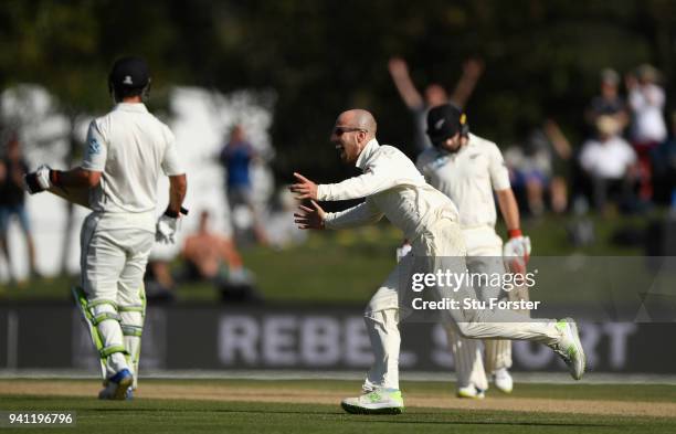England bowler Jack Leach celebrates after taking the wicket of Tom Latham during day five of the Second Test Match between the New Zealand Black...