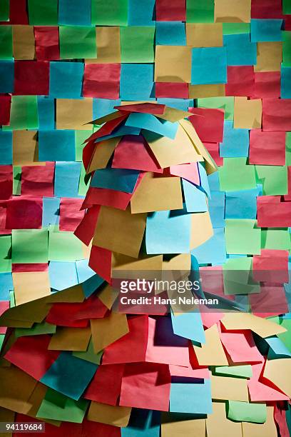 businessman wrapped in sticky notes, mexico city, mexico - postit foto e immagini stock