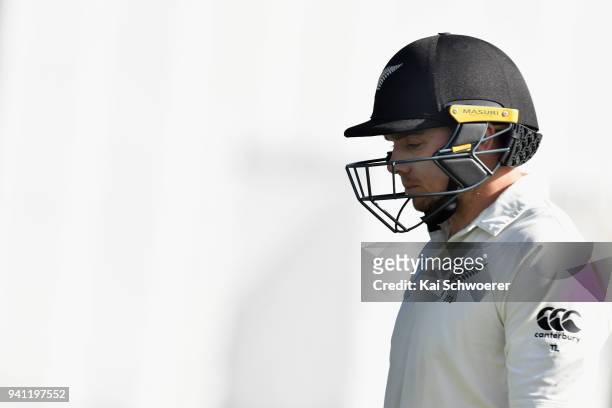 Tom Latham of New Zealand looks dejected after being dismissed by Jack Leach of England during day five of the Second Test match between New Zealand...