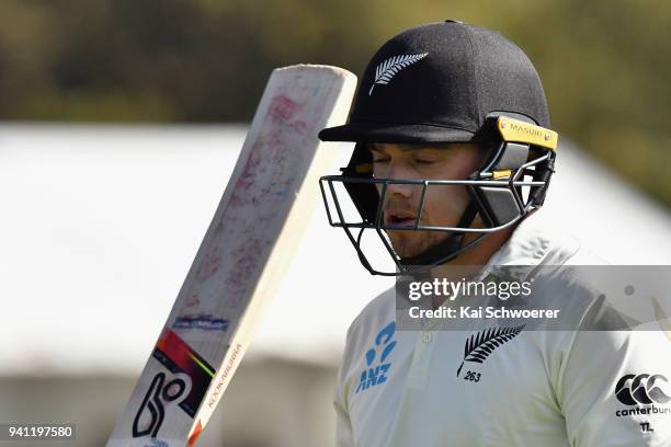 Tom Latham of New Zealand looks dejected after being dismissed by Jack Leach of England during day five of the Second Test match between New Zealand...