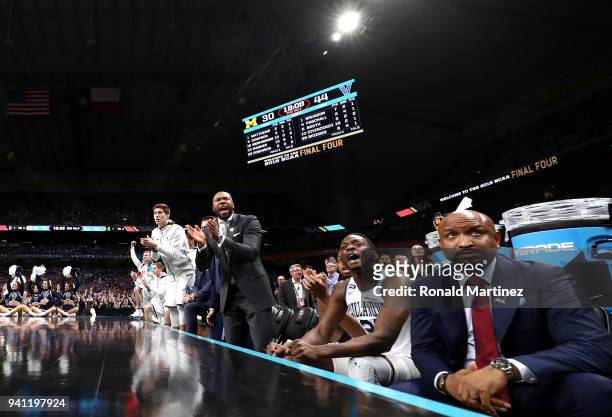 Dhamir Cosby-Roundtree of the Villanova Wildcats reacts with the bench in the second half against the Michigan Wolverines during the 2018 NCAA Men's...