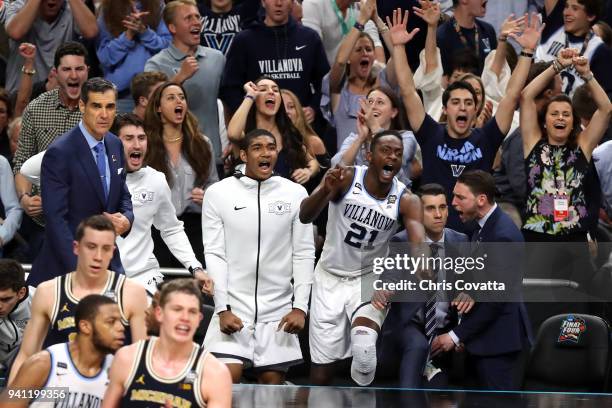 Dhamir Cosby-Roundtree of the Villanova Wildcats reacts with his team on the bench in the second half against the Michigan Wolverines during the 2018...