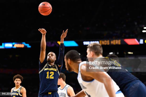 Muhammad-Ali Abdur-Rahkman of the Michigan Wolverines shoots a free thros against the Villanova Wildcats during the second half of the 2018 NCAA...