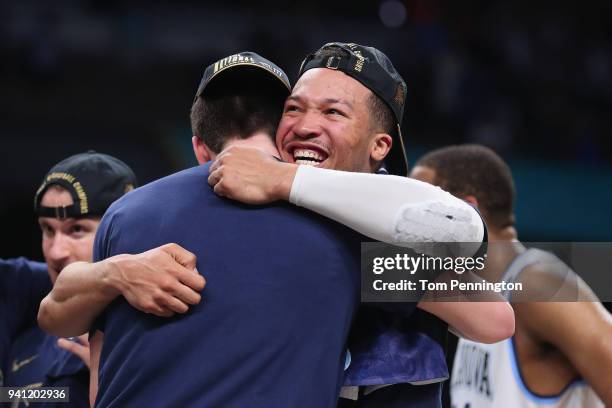 Jalen Brunson of the Villanova Wildcats celebrates with teammates after defeating the Michigan Wolverines during the 2018 NCAA Men's Final Four...