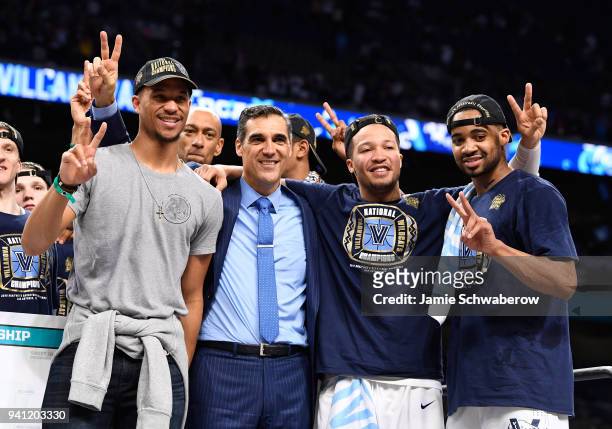 Head coach Jay Wright, Jalen Brunson, and Phil Booth of the Villanova Wildcats celebrate after the 2018 NCAA Photos via Getty Images Men's Final Four...
