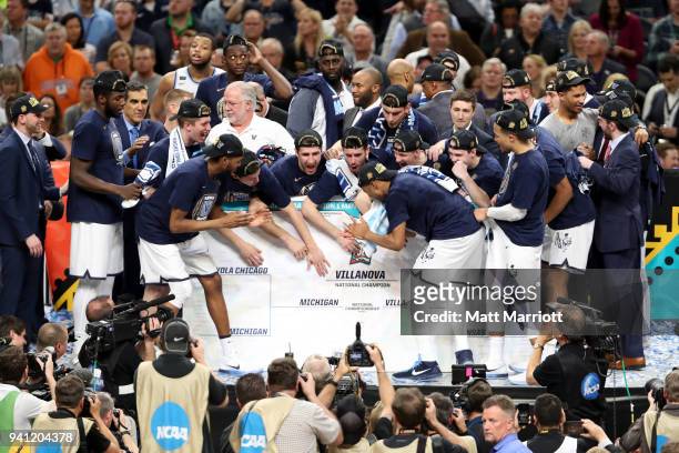 The Villanova Wildcats celewbrate on stage after the 2018 NCAA Photos via Getty Images Men's Final Four National Championship game against the...