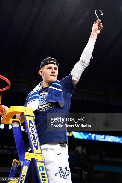 Donte DiVincenzo of the Villanova Wildcats holds a piece of the net after the 2018 NCAA Photos via Getty Images Men's Final Four National...