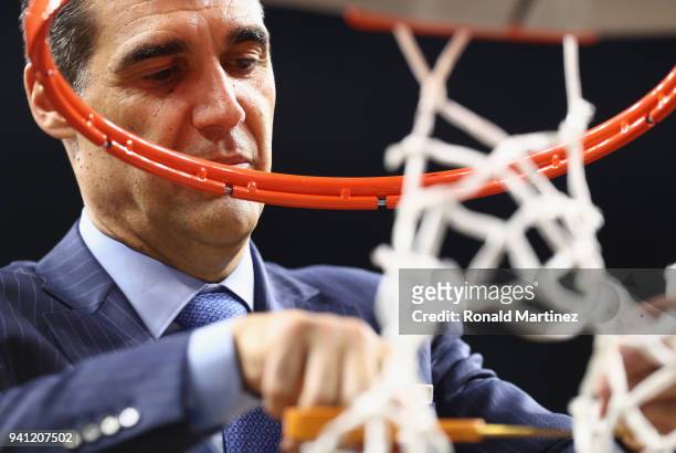 Head coach Jay Wright of the Villanova Wildcats cuts down the net after defeating the Michigan Wolverines during the 2018 NCAA Men's Final Four...