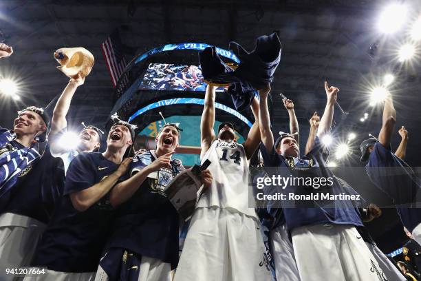The Villanova Wildcats celebrate after defeating the Michigan Wolverines during the 2018 NCAA Men's Final Four National Championship game at the...