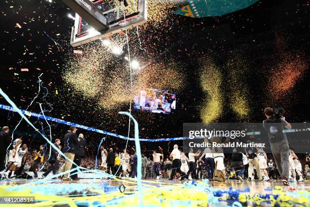 Confetti falls as the Villanova Wildcats celebrate after defeating the Michigan Wolverines during the 2018 NCAA Men's Final Four National...