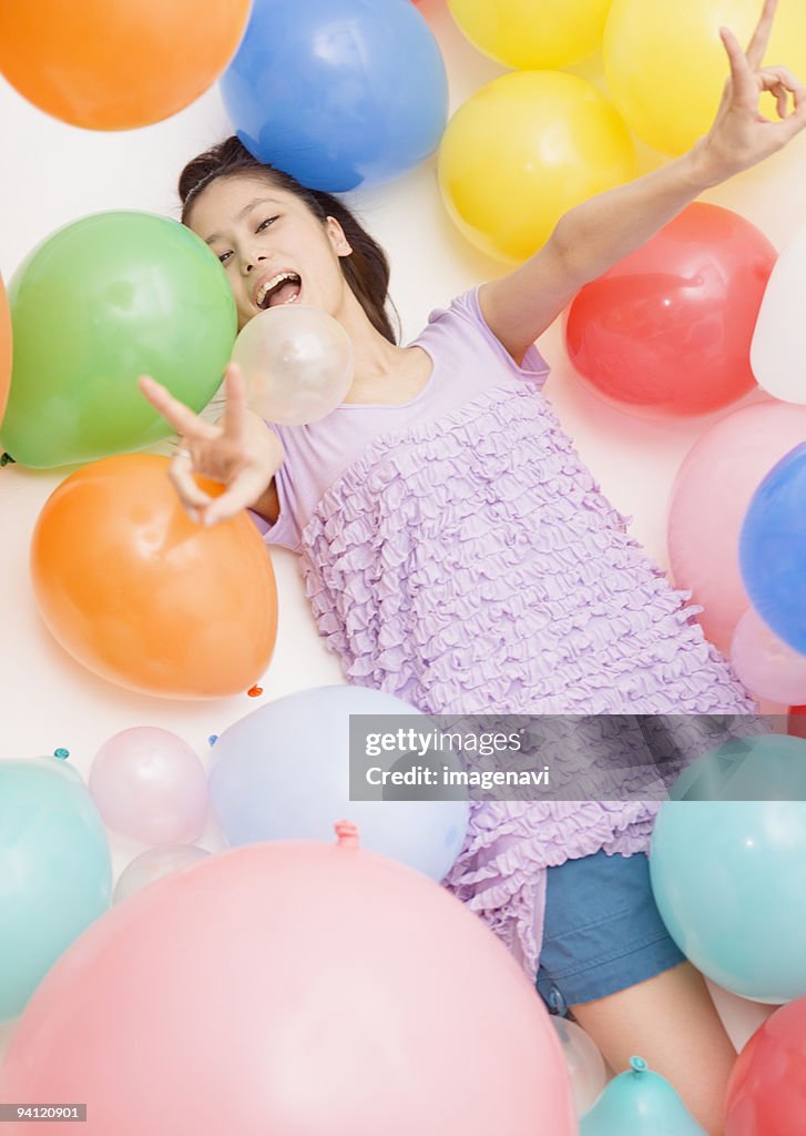 Young woman and balloons