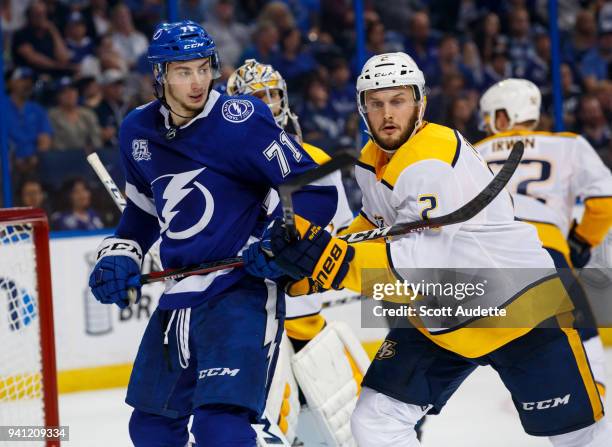 Anthony Cirelli of the Tampa Bay Lightning skates against Anthony Bitetto of the Nashville Predators during the third period at Amalie Arena on April...