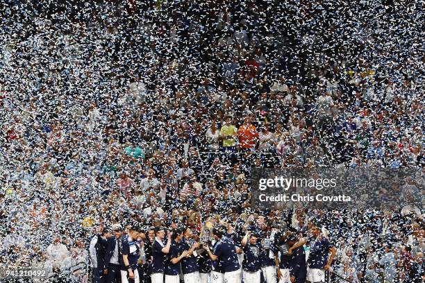 Confetti falls as the Villanova Wildcats celebrate after defeating the Michigan Wolverines during the 2018 NCAA Men's Final Four National...