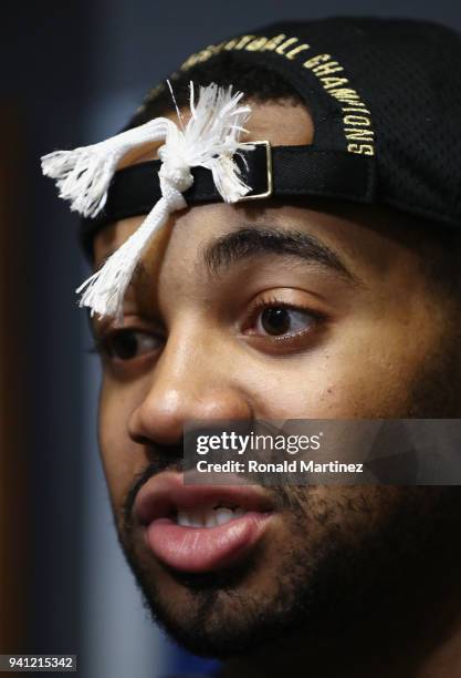 Phil Booth of the Villanova Wildcats speaks to the media in the locker room after defeating the Michigan Wolverines during the 2018 NCAA Men's Final...