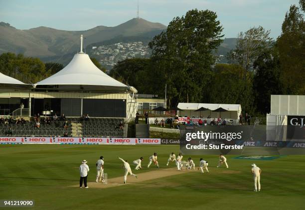 England players surround the bat as Dawid Malan bowls to Neil Wagner towards the close of play during day five of the Second Test Match between the...