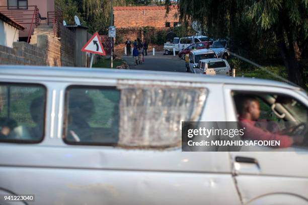 Minibus taxi drives on April 3, 2018 near the house of late South African anti-apartheid campaigner Winnie Madikizela-Mandela, ex-wife of former...