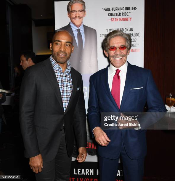 Tiki Barber and Geraldo Rivera attend Sean Hannity & Friends celebrate the publication of "The Geraldo Show: A Memoir" by Geraldo Rivera at Del...