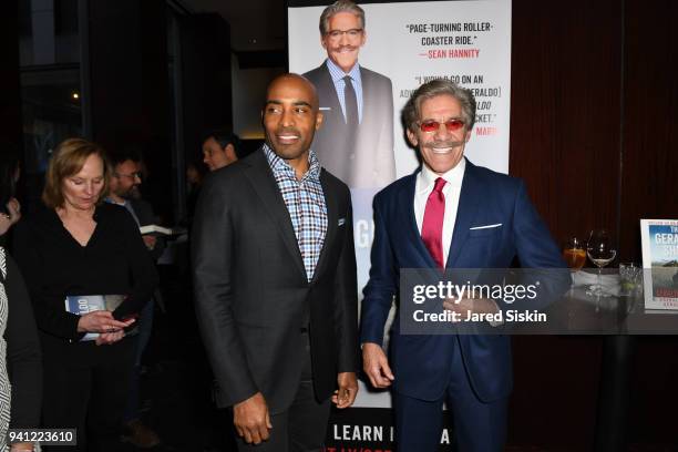 Tiki Barber and Geraldo Rivera attend Sean Hannity & Friends celebrate the publication of "The Geraldo Show: A Memoir" by Geraldo Rivera at Del...