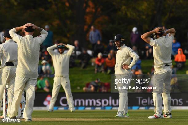 Mark Stoneman of England and his team mates react during day five of the Second Test match between New Zealand and England at Hagley Oval on April 3,...