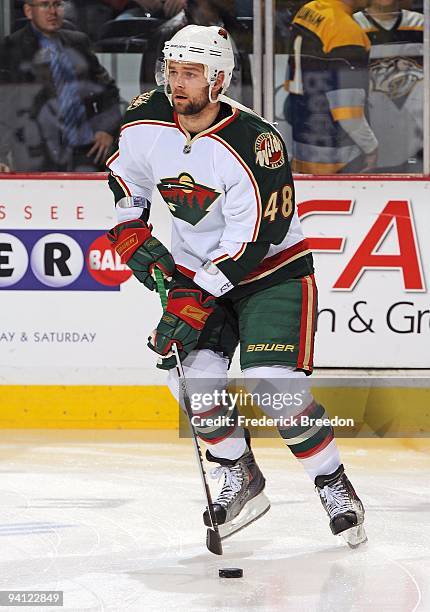 Guillaume Latendresse of the Minnesota Wild skates against the Nashville Predators at the Sommet Center on December 5, 2009 in Nashville, Tennessee.