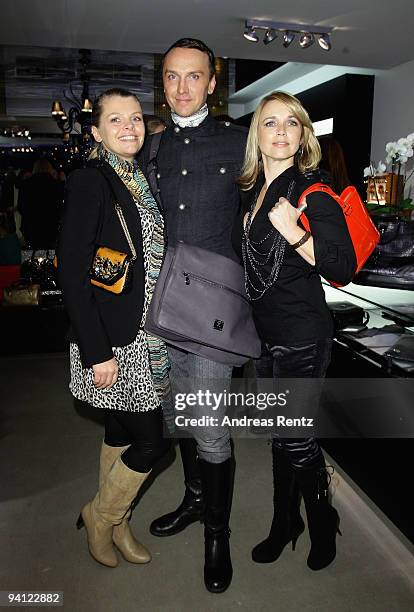 Actress Anne-Sophie Briest, Hubertus Regout and actress Tina Ruland attend the pre-Christmas reception at MCM store on December 7, 2009 in Berlin,...
