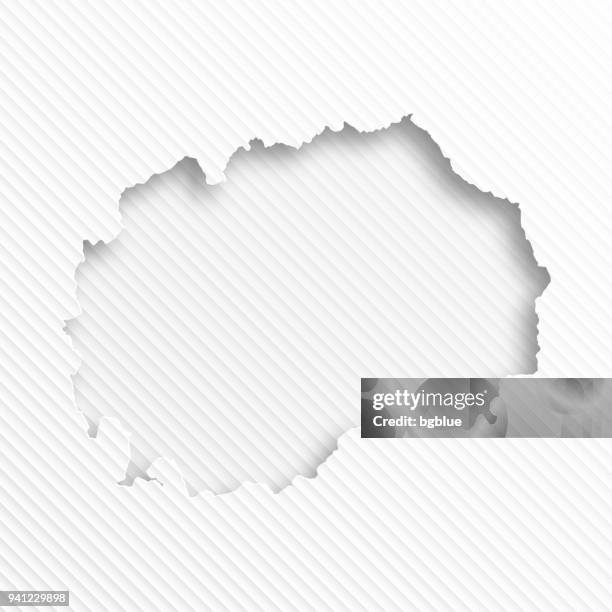 macedonia map with paper cut on abstract white background - macedonia country stock illustrations