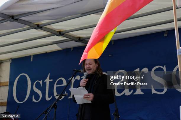 Ludo De Brabander, spokesperson for the Belgian peace organisation Vrede, addresses the rally. Thousands of people from several peace organisations...