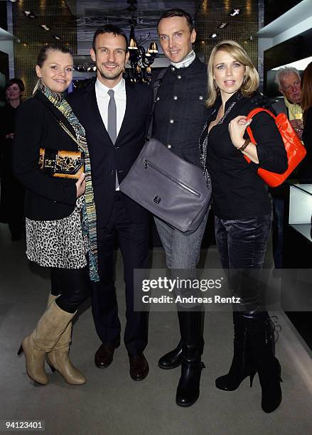 Actress Anne-Sophie Briest, Eric Erhardt , Hubertus Regout and actress Tina Ruland attend the pre-Christmas reception at MCM store on December 7,...
