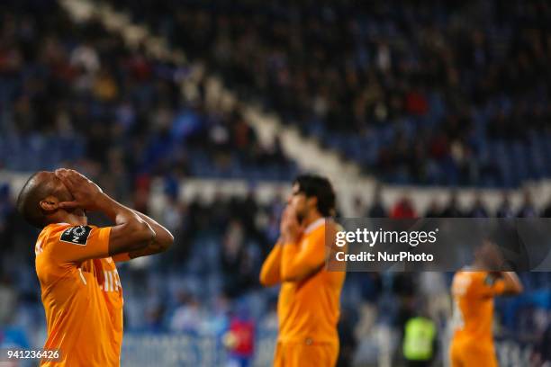 Porto's midfielder Yacine Brahimi reacts during the Portuguese League football match between Belenenses and FC Porto at Restelo stadium in Lisbon on...