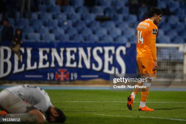Porto's forward Goncalo Paciencia reacts next to Belenenses's goalkeeper Andre Moreira during the Portuguese League football match between Belenenses...